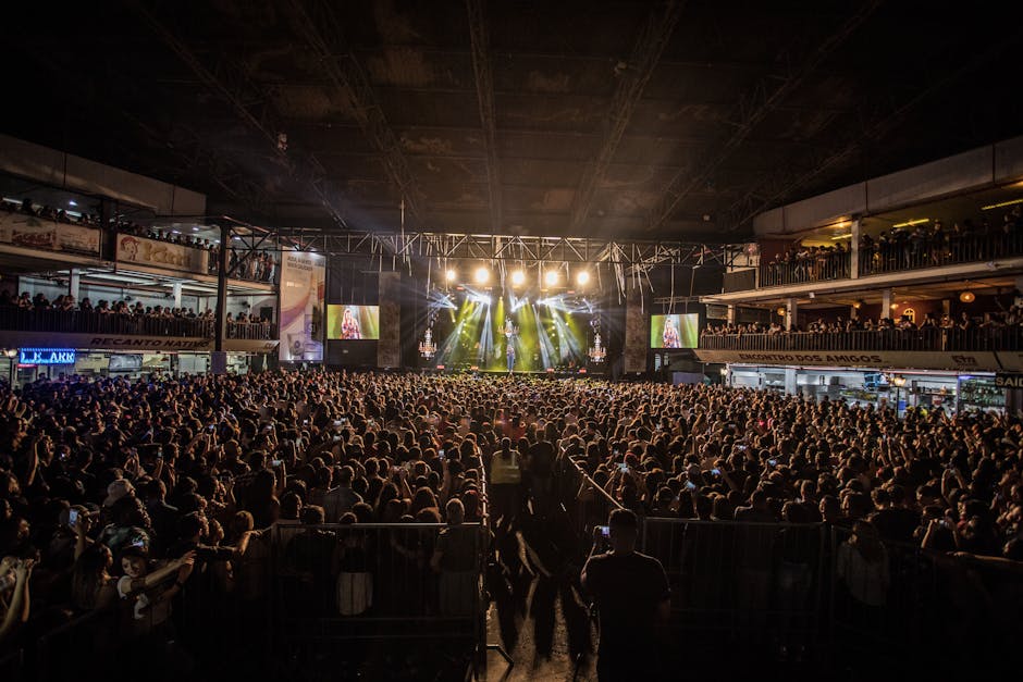 A lively indoor concert with a massive crowd in São Paulo, capturing the essence of live music and entertainment.